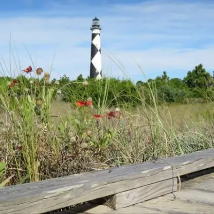 view of Cape Lookout lighthouse from boardwalk